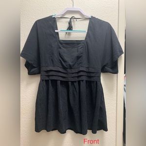 Cinnamon Girl black sleeve top.